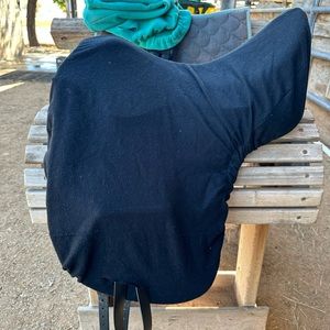 Black flannel saddle cover embroidered “Positive vibes good rides”
